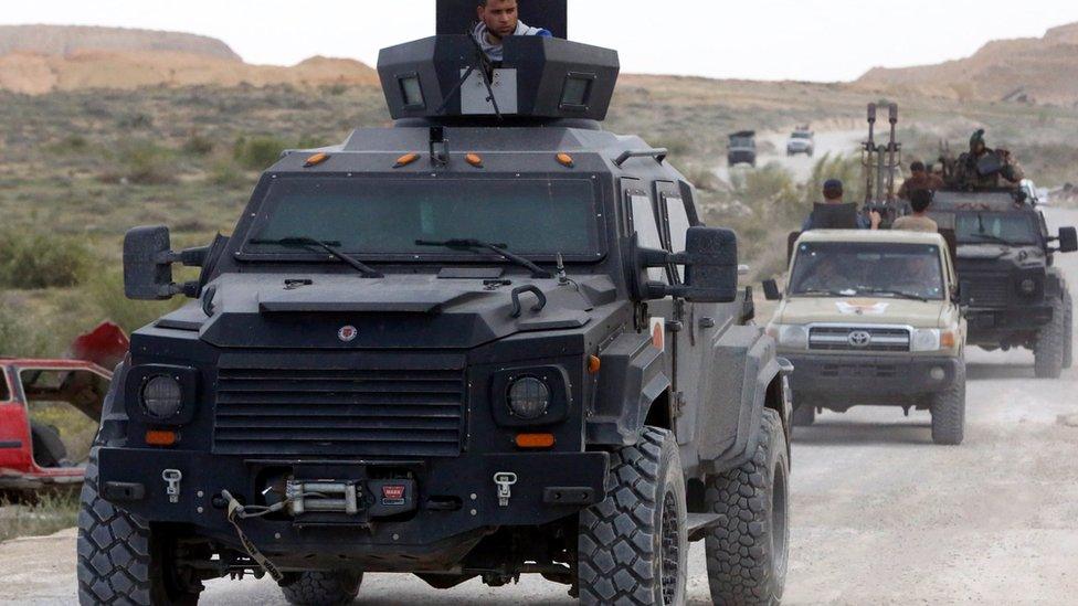 Fighters from alliance of Islamist-backed militias during clashes with opposing militia in Bir al-Ghanam, south of the Libyan capital Tripoli. 21 March 2015