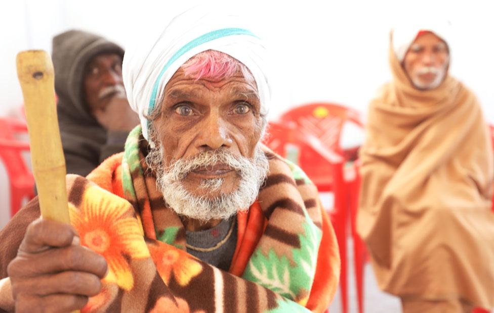 An old man lost at the Kumbh Mela