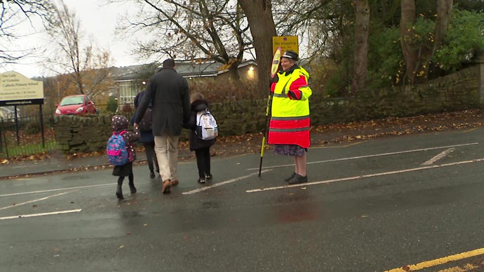 Susan Chilton helping children across the road