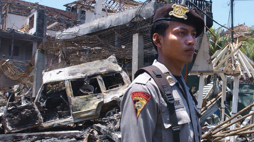 The destroyed remains of a nightclub following a bomb blast in Denpasar, on the Indonesian island of Bali, 13 October 2002