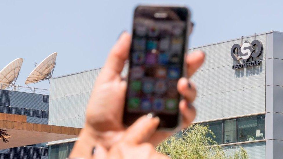 Mobile phone in front of NSO building (file photo)