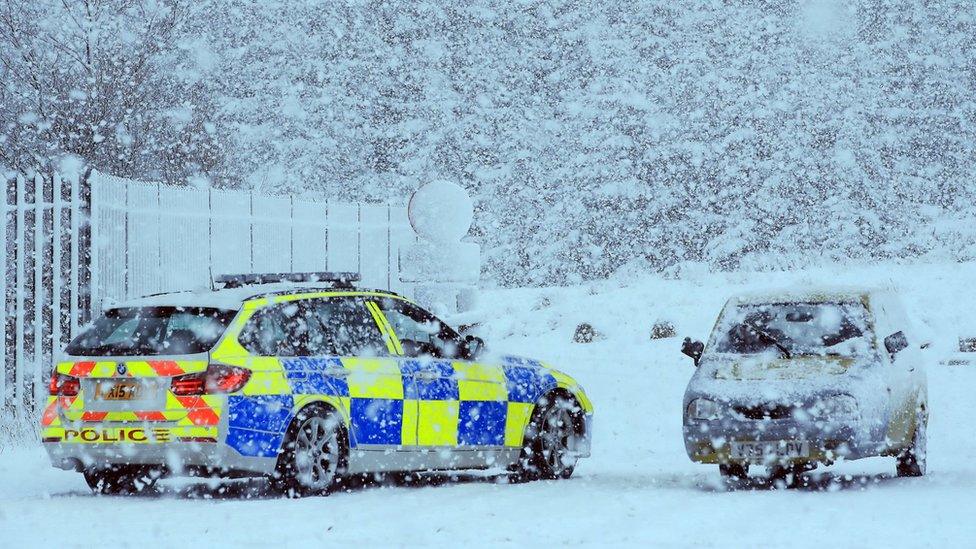 Police car and Robin Reliant in Cumbria