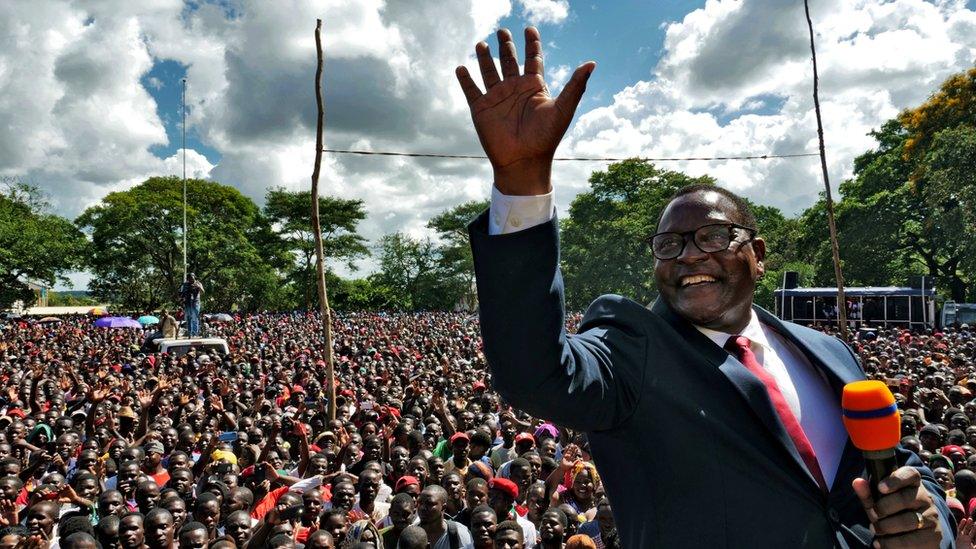 Opposition Malawi Congress Party leader Lazarus Chakwera addresses supporters after a court annulled the May 2019 presidential vote in Lilongwe