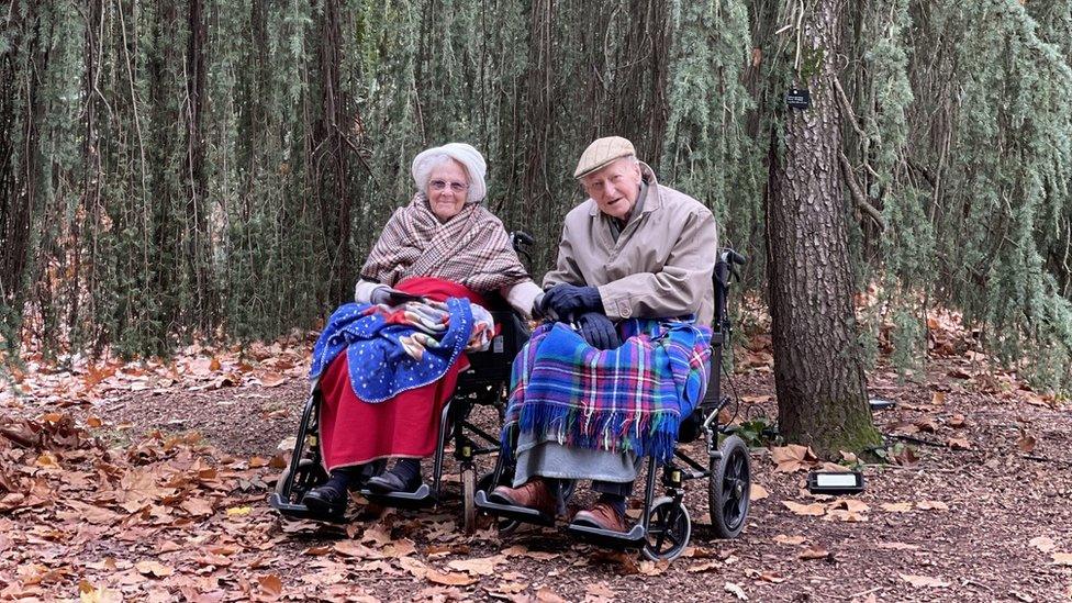 Couple in wheelchairs