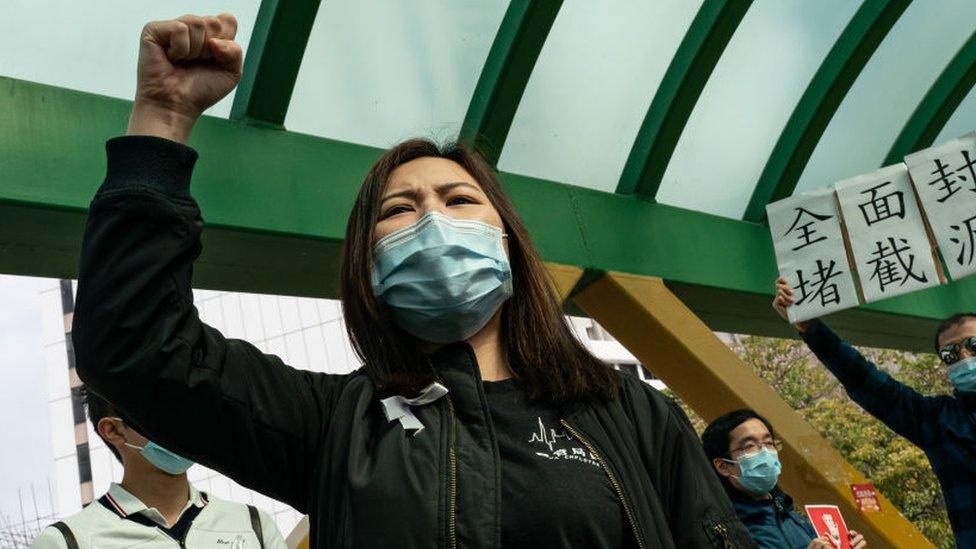 Medical workers hold a strike near Queen Mary Hospital