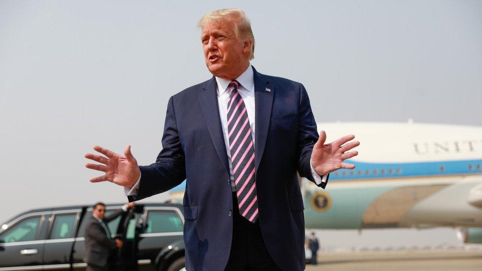 Mr Trump speaks to the press ahead of a briefing on wildfires