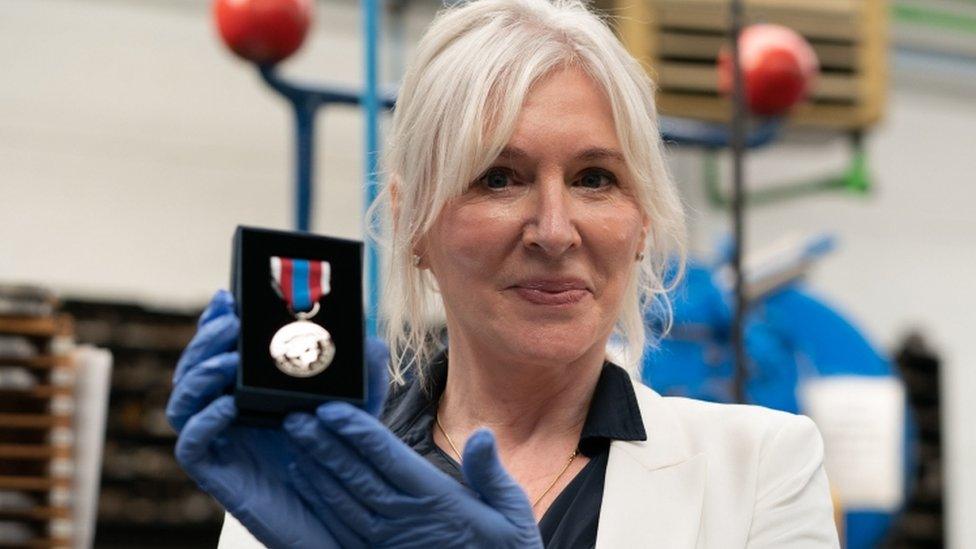 Nadine Dorries with a medal