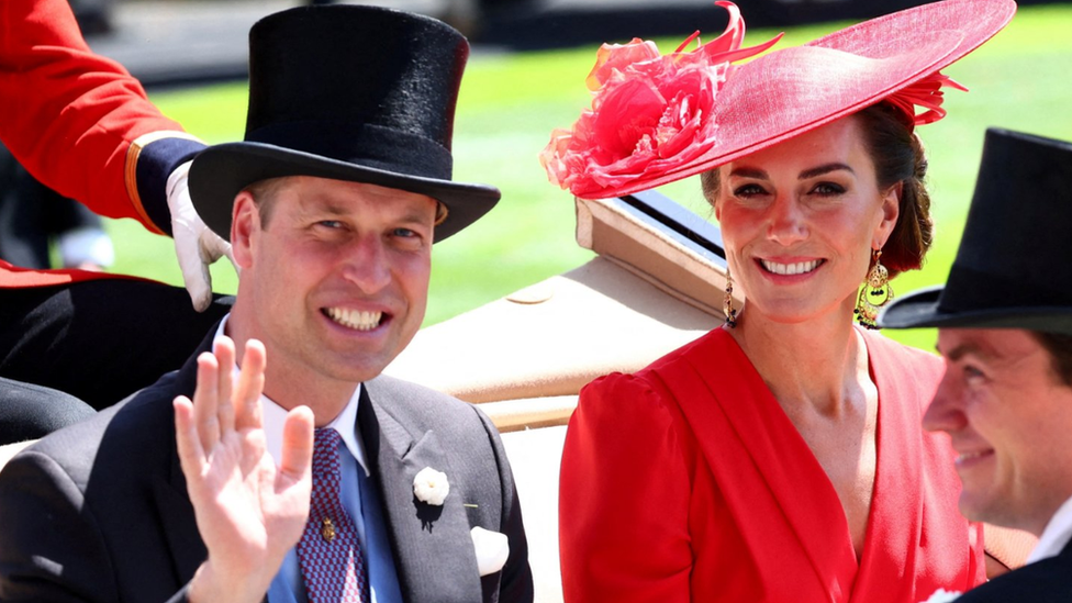 The Prince and Princess of Wales wave during a royal procession ahead of Royal Ascot