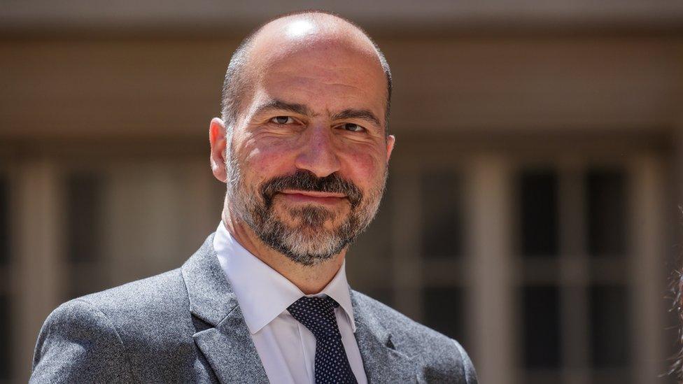 Dara Khosrowshahi arrives at a tech summit in Paris