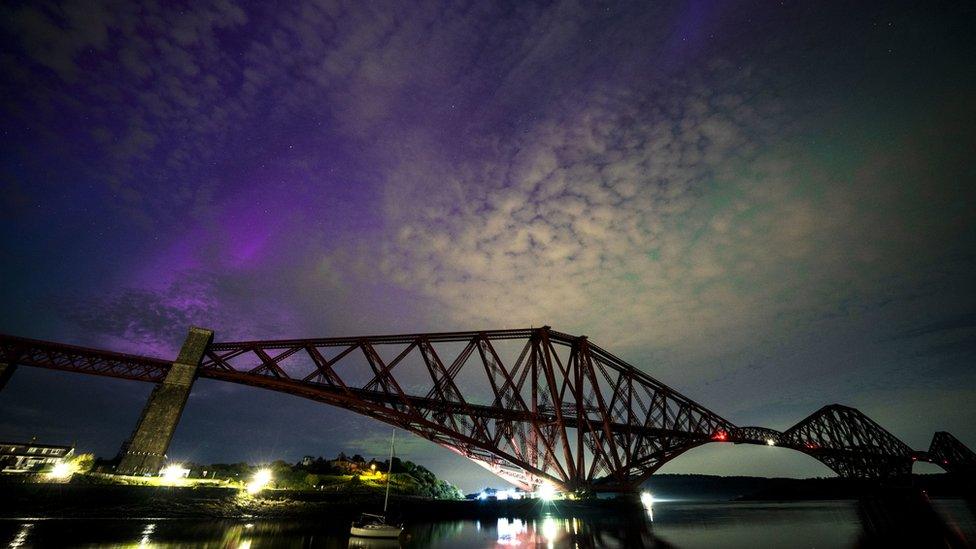 A picture of the Northern Lights over the Forth Bridge at North Queensferry.