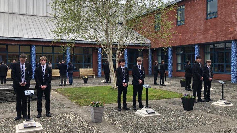 Pupils at the unveiling of St Columb's College memorial garden.