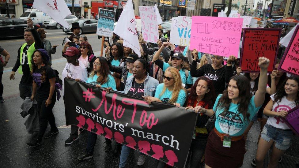 People participate in a protest march for survivors of sexual assault and their supporters on Hollywood Boulevard in Hollywood, Los Angeles, California U.S. November 12, 2017.