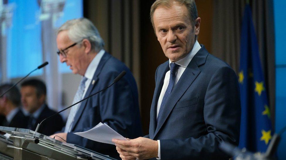 European Commission President Jean-Claude Juncker (L) and European Council President Donald Tusk speak to the media in Brussels on March 21, 2019