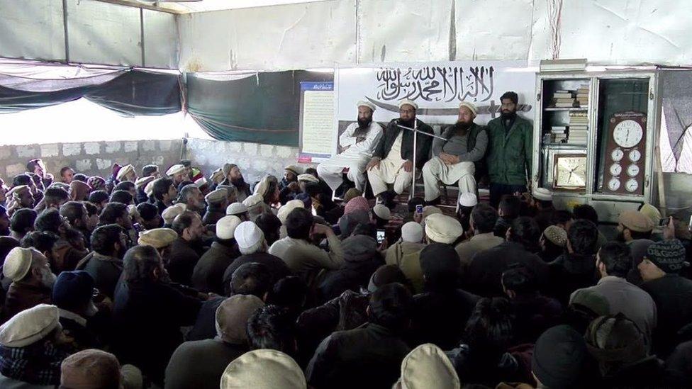 Hafiz Saeed (second from left) addresses activists in Muzaffarabad 11 January