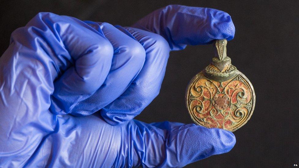 An Anglo-Saxon hanging bowl mount from AD 600-725, found in West Sussex, seen during a photocall at the British museum in London