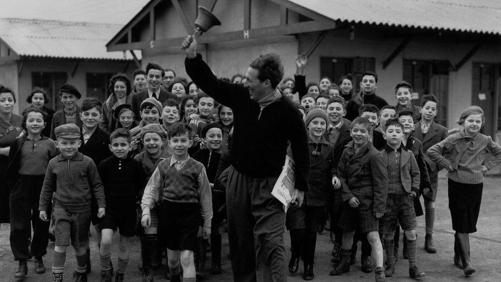 Kindertransport children at Dovercourt Bay, led by Trevor Chadwick