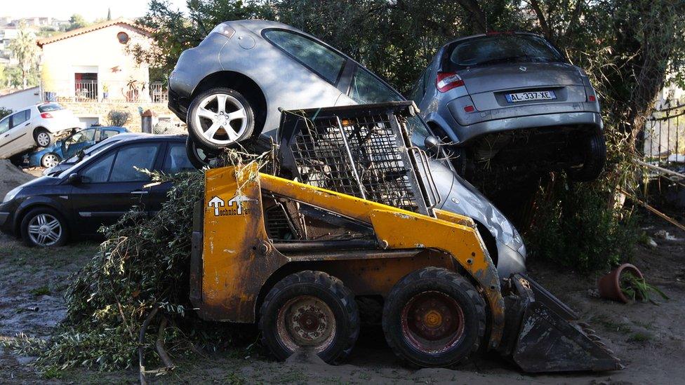 Damaged cars in Biot, southeastern France, after sever flooding, on 4 October