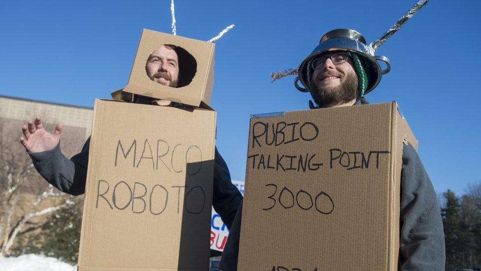 People depicting robots mock Republican presidential candidate Marco Rubio"s performance at the 06 February Republican debate; outside a Rubio campaign event at Londonderry High School in Londonderry, New Hampshire, USA, 07 February 2016. The New Hampshire primary will be held on 09 February 2016.