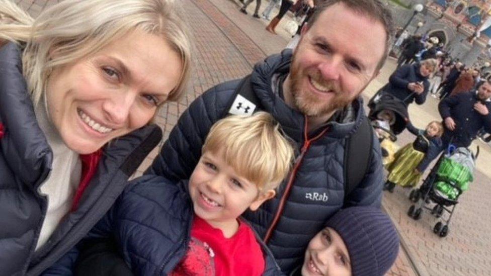 Damien with his wife and two children at Disneyland Paris