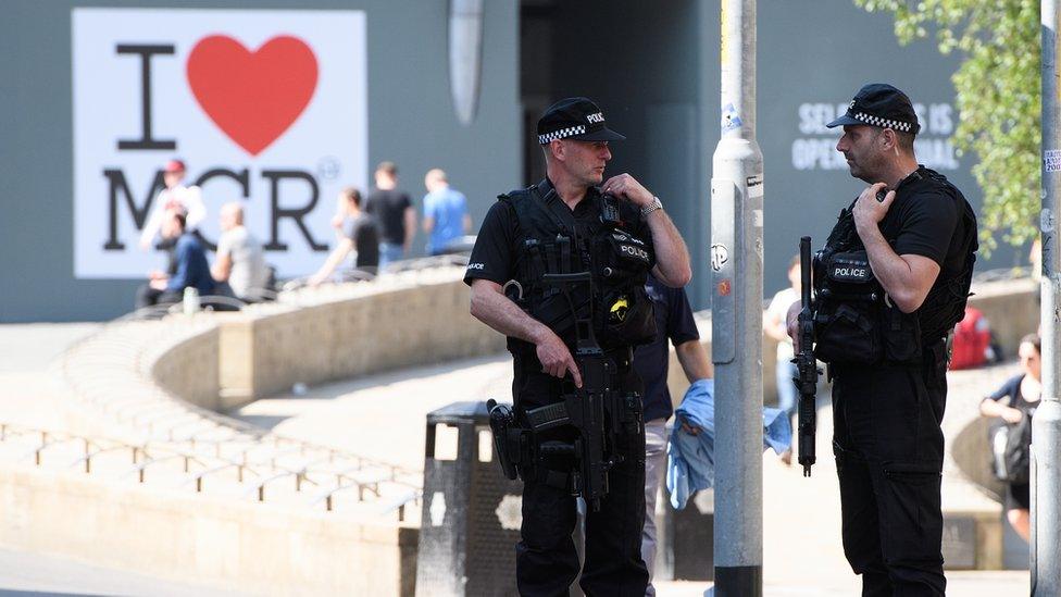 Armed police in Manchester following the attack