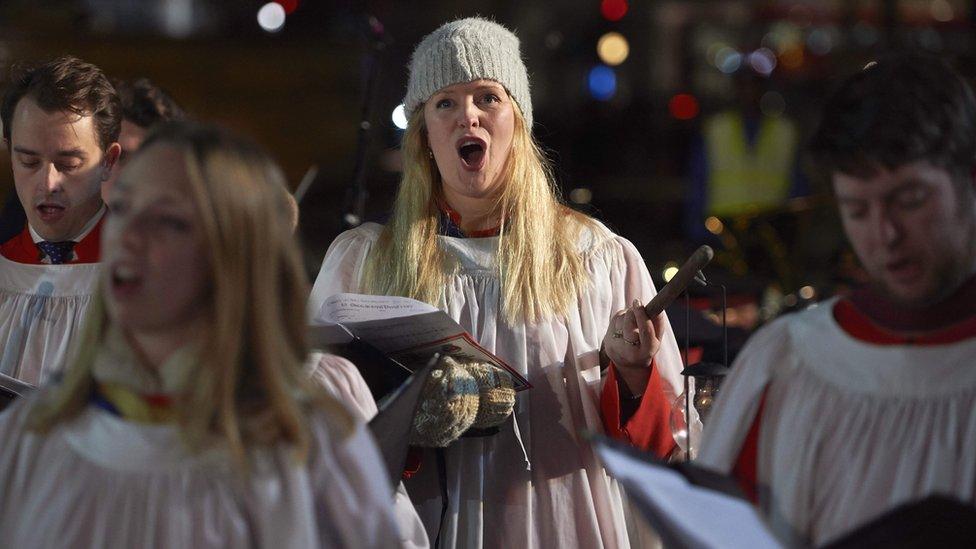 Chorister singing carols