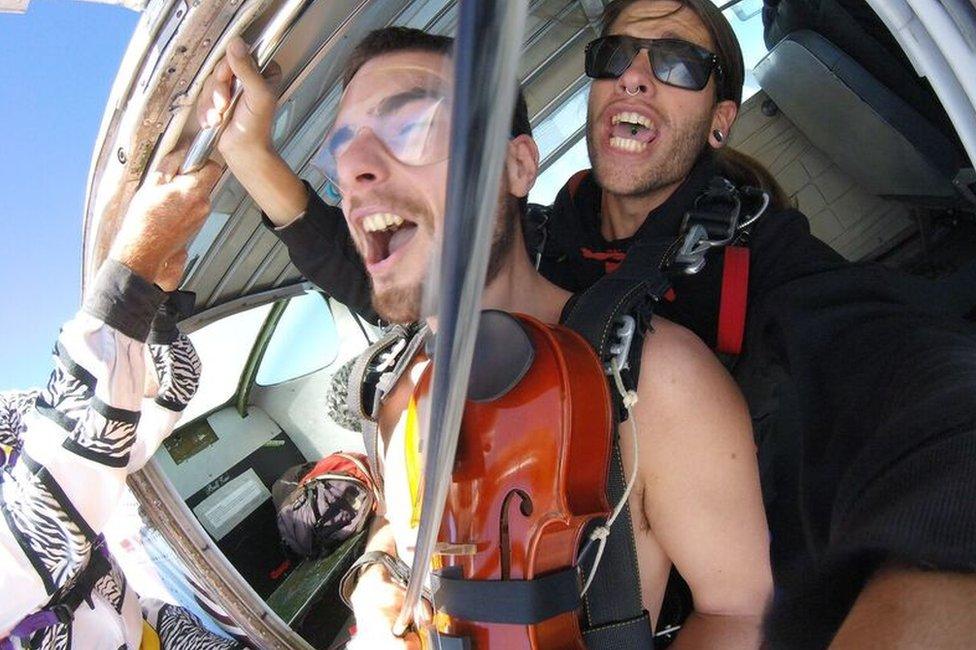 Glen Donnelly and instructor preparing to leap