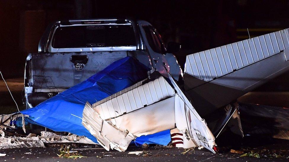 The wreckage of a light plane is seen in Scarlet Street in Melbourne"s Mordialloc, Victoria, Australia on 8 June 2018