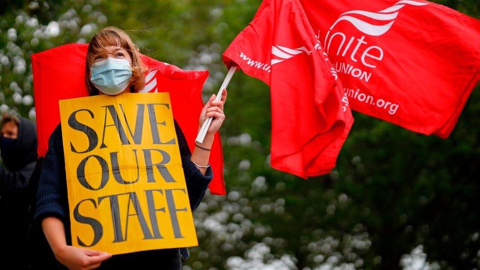 Unite union protester demonstrating against staff cuts at the National Theatre in London