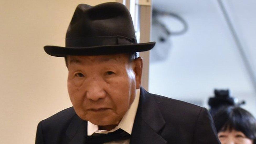 Former Japanese professional boxer Iwao Hakamada (L), who was sentenced to death for the murder of four members of a family in 1966 and released in 2014, and his sister Hideko (R) leave after a press conference in Tokyo on November 25, 2019.