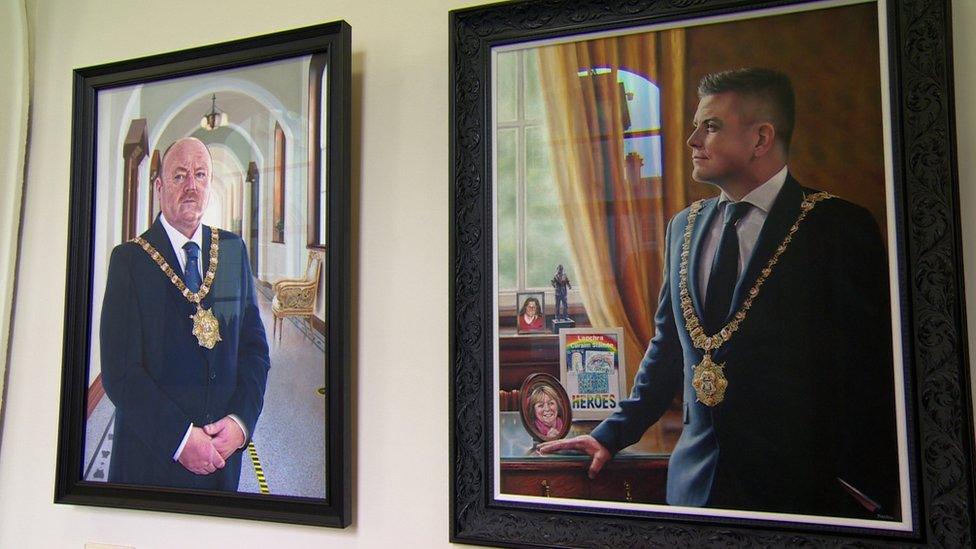 Portraits in Belfast City Hall of former lord mayors Frank McCoubrey and Daniel Baker