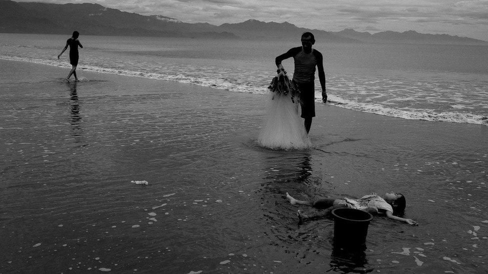 Fisherman and family in the Philippines