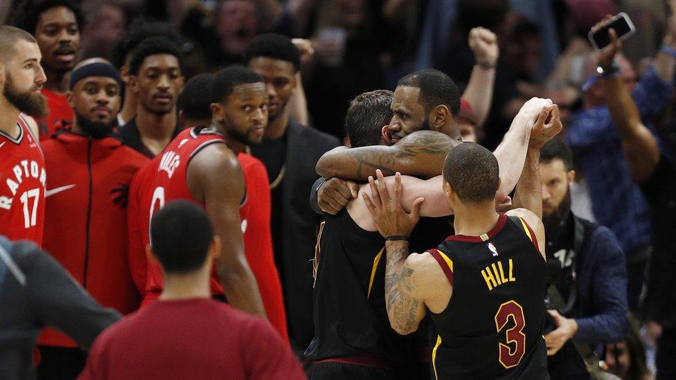 LeBron James celebrating with teammates