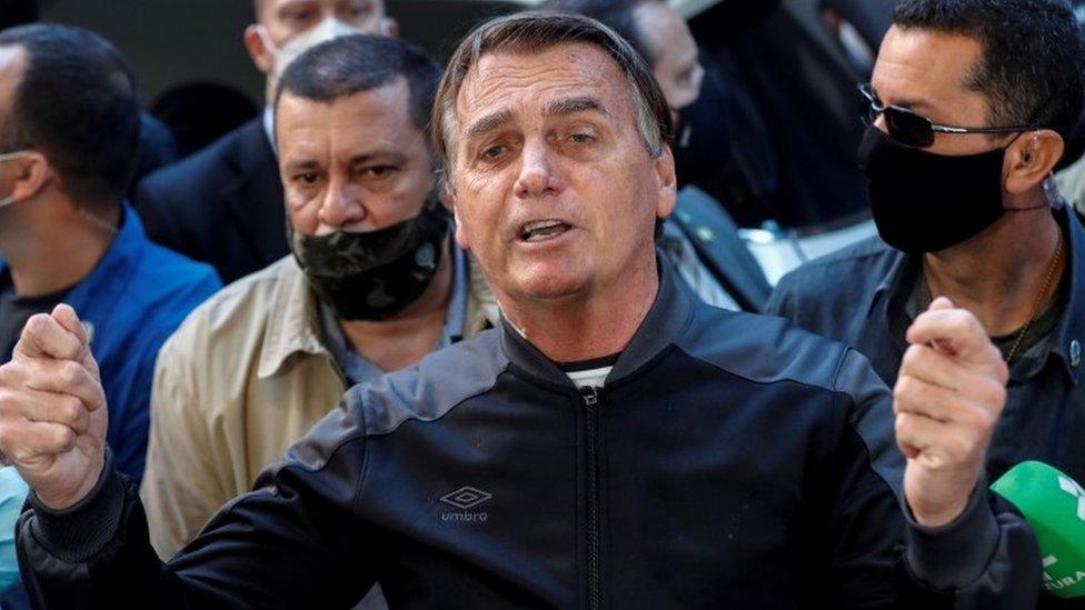 Brazilian President Jair Bolsonaro delivers remarks after he was discharged from the Vila Nova Star Hospital