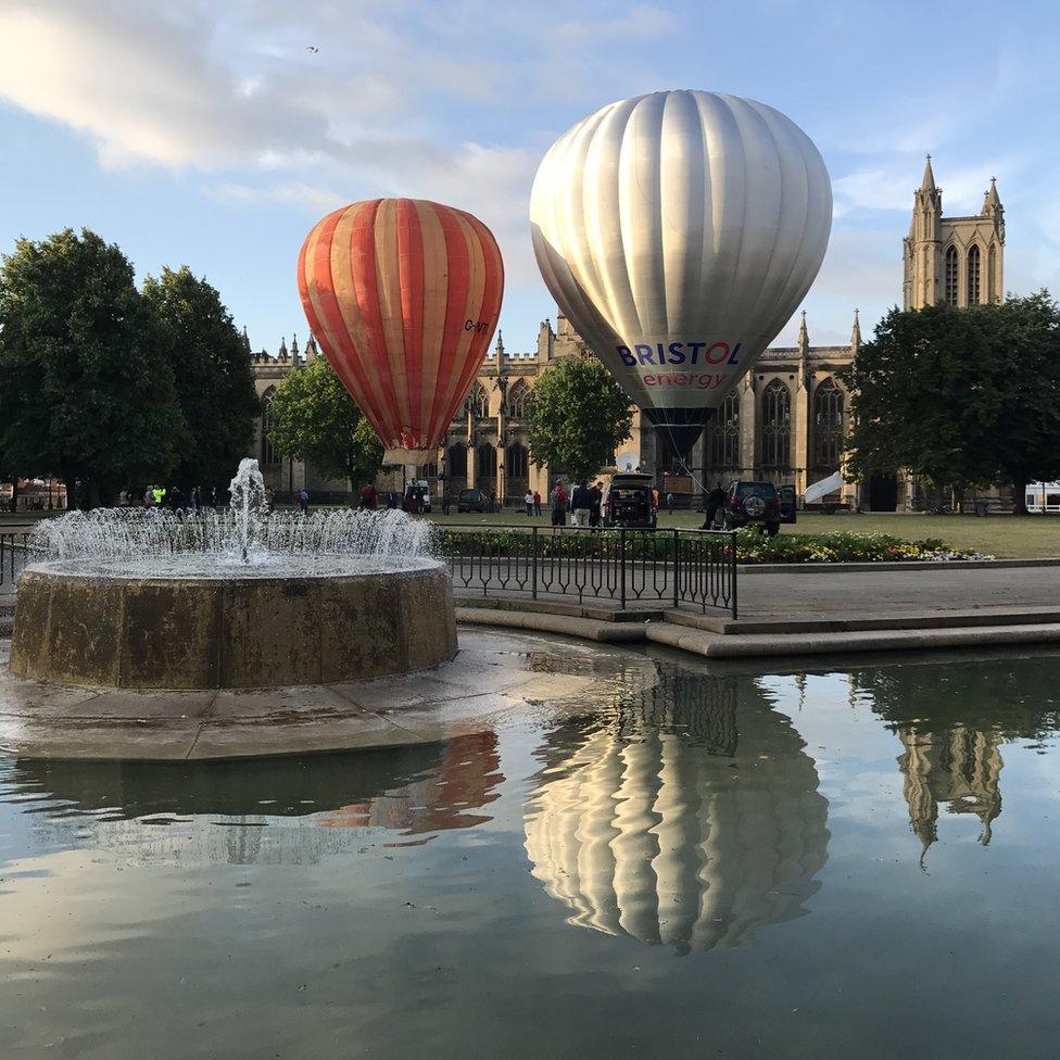 Balloons tethered outside Bristol Cathedral