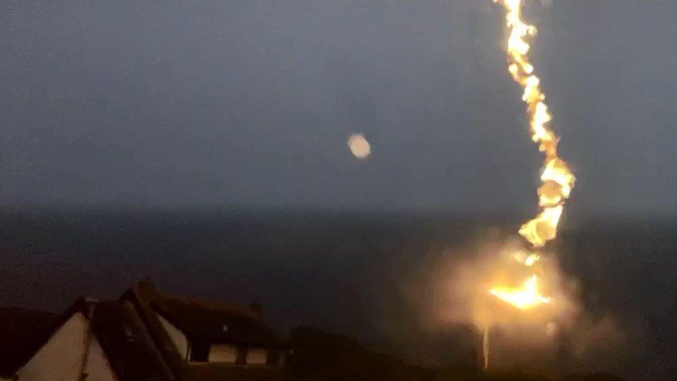 Lightning strike on a street light in Peel