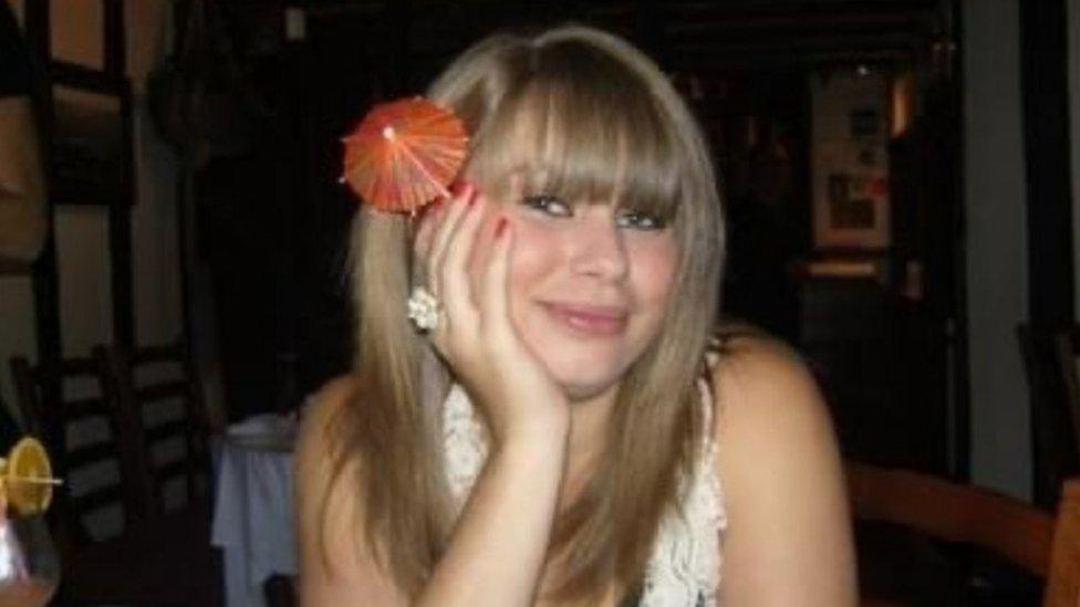 Lauren Taylor,16, with a cocktail umbrella in her hair.