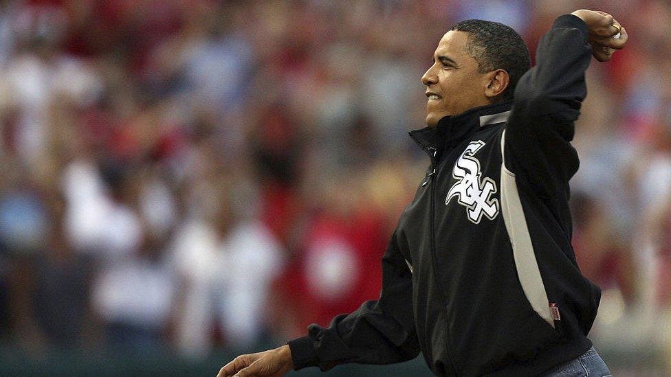 Barack Obama throws a pitch