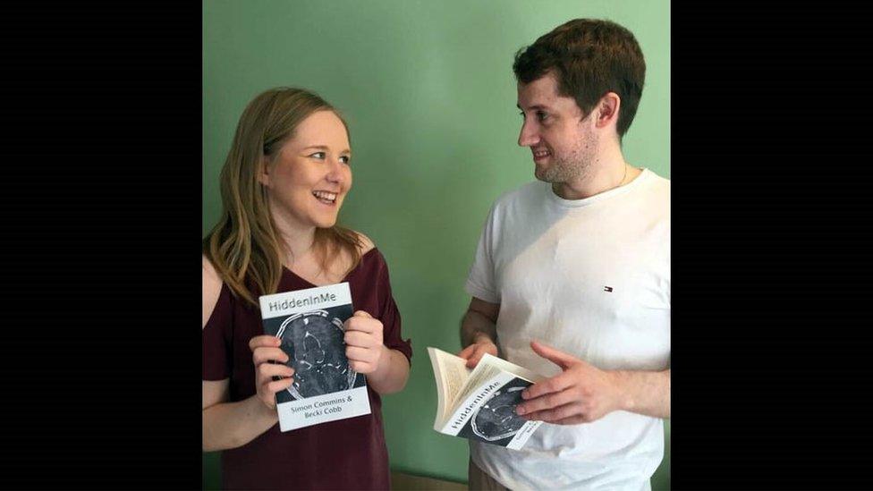 Becki and Simon hold their book HiddenInMe