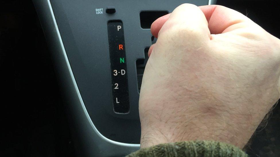 Man using automatic gears