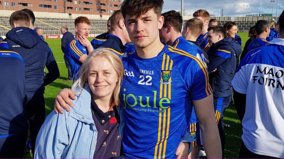 Laurie Kearon celebrating a GAA victory with her Irish-born teenager son