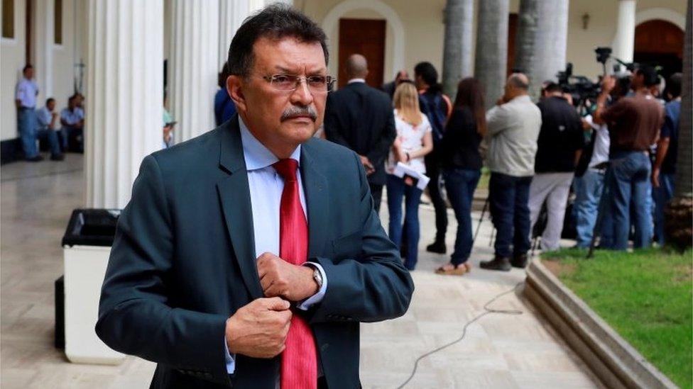 Venezuela's deputy of Venezuela's United Socialist Party (PSUV) German Ferrer leaves Venezuela's National Assembly after a session in Caracas, Venezuela July