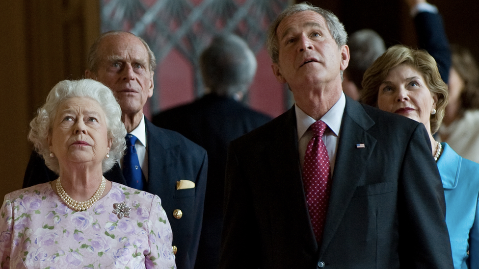 George and Laura Bush stand with Prince Phillip and the Queen on a tour of Windsor Castle in 2008