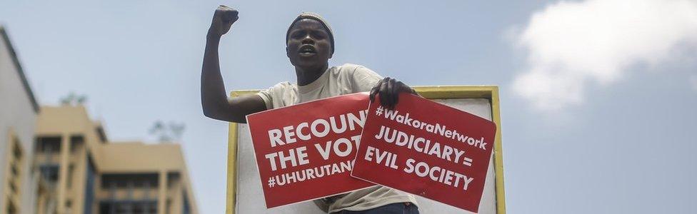 Supporters of President Uhuru Kenyatta and his Jubilee party protest against the country's Supreme Court, which ruled in favour of opposition leader Raila Odinga and overturned the presidential election held on 8 August 2017, in downtown Nairobi, Kenya, 19 September 2017