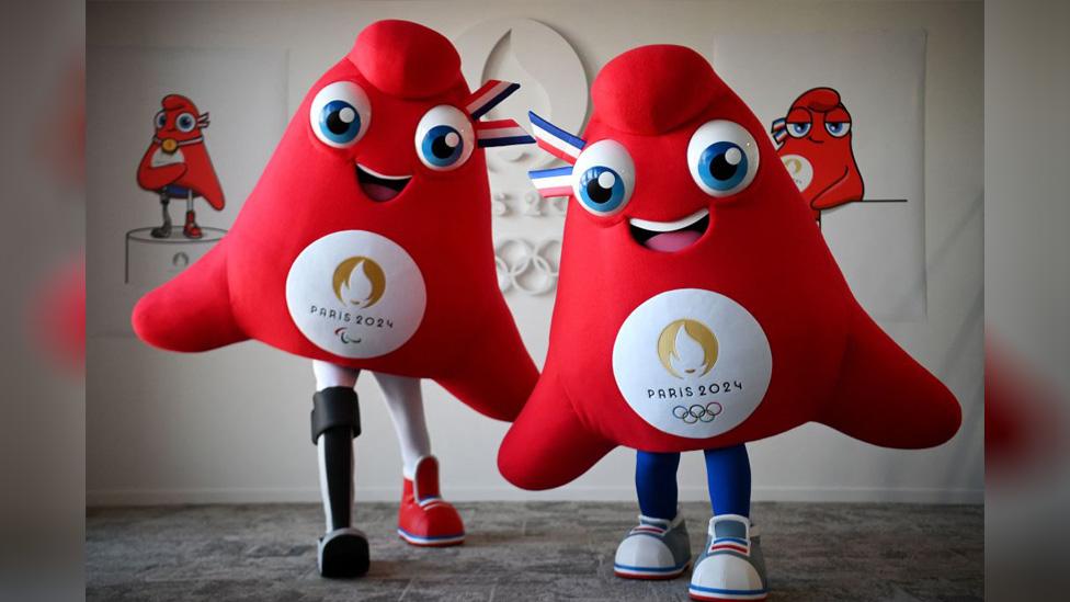 The Paris 2024 Olympic mascots are big, red and triangular -shaped like a Phrygian cap