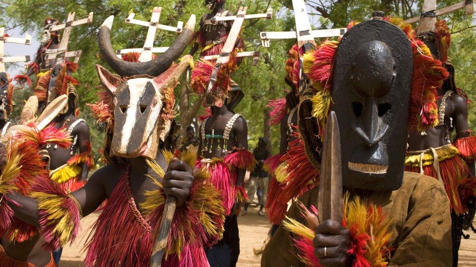 People in traditional Dogon costumes