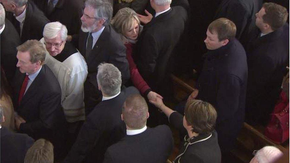 Arlene Foster and Michelle O'Neill handshake