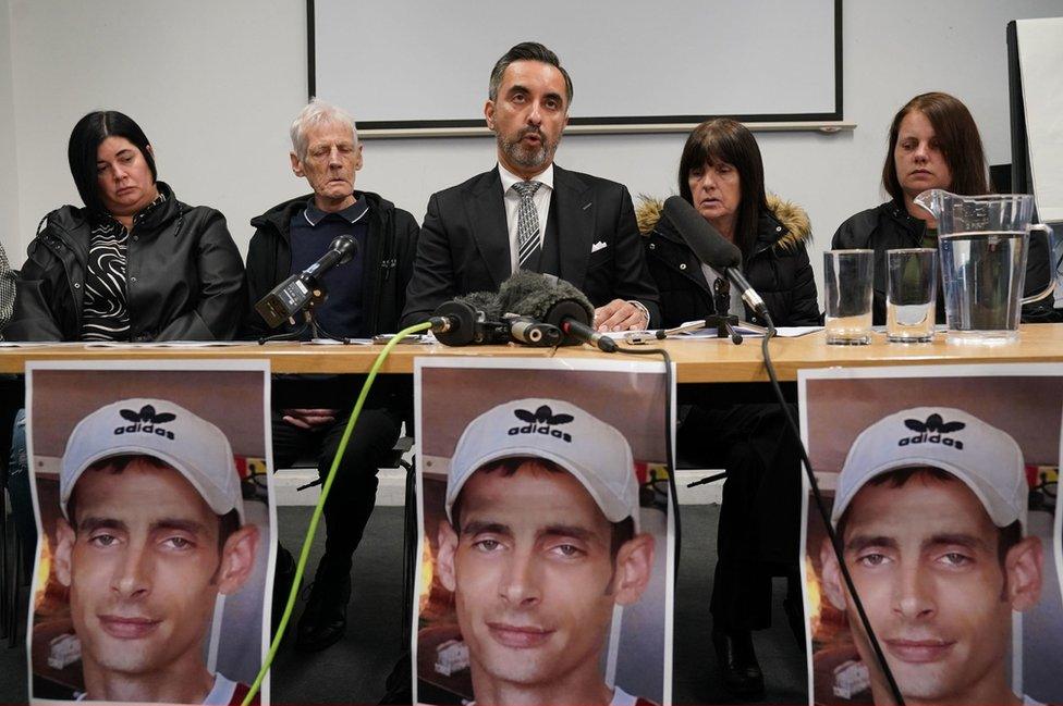 Sneddon family and lawyer Aamer Anwar (centre)