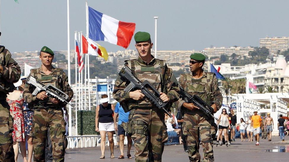 Soldiers patrol the Nice waterfront