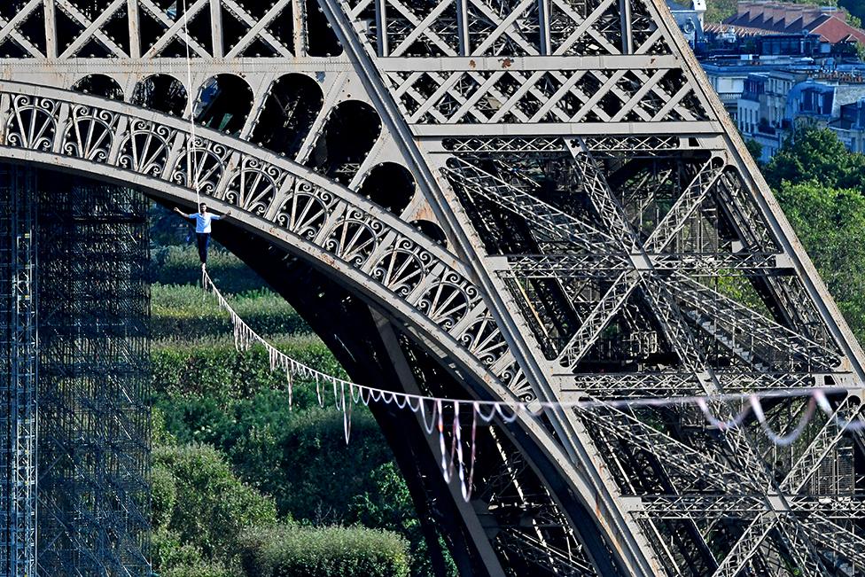 French highliner Nathan Paulin performs on a 70-metre-high slackline in Paris.