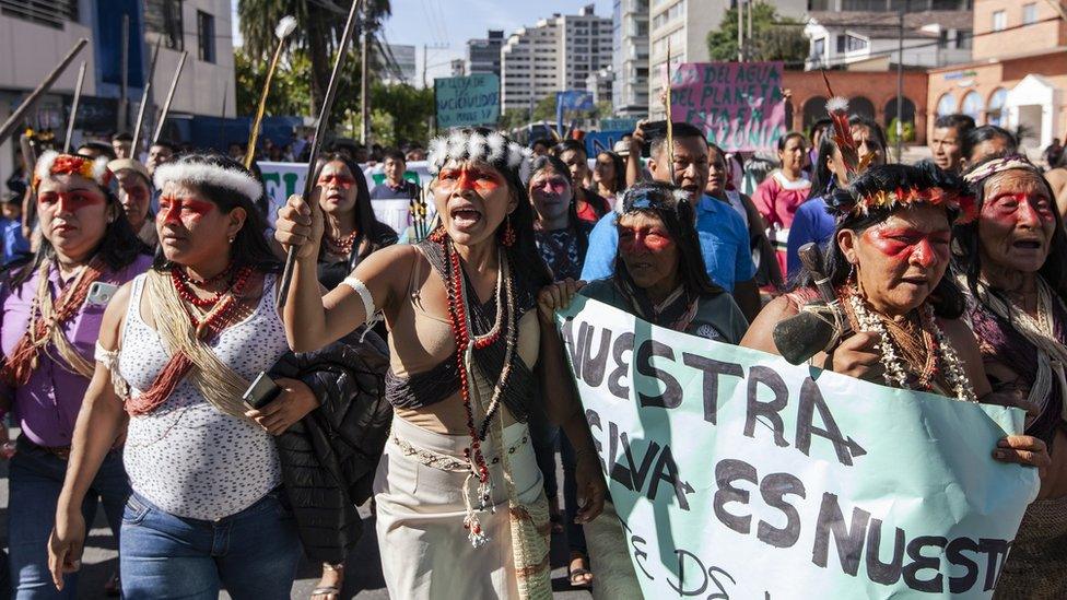 Nemonte Nenquimo leads a protest against the auctioning off of oil concessions